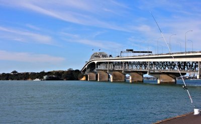 The 1,020 m (3,348 ft) long bridge is an eight-lane box truss motorway bridge over the Waitemata Harbour, Auckland City with the North Shore. 