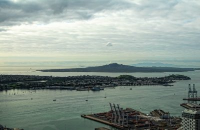 Looking through blue-tinted windows:
Over the Waitemata Harbour to Devonport on the North Shore
to Rangitoto Island, with Coromandel in the far distance