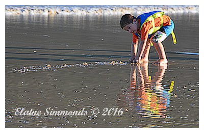 A young child making the most
of the Indian Summer we are
experiencing at this time was
totally engrossed in play and
oblivious to anyone around.