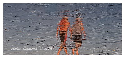 At low tide, reflections are wonderful.
This couple were oblivious to me.