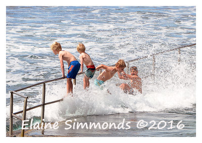 On a sparkling spring day,
these young boys were making the most
of the waves.