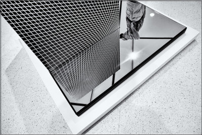 Art Gallery Geometric With Man's Reflection