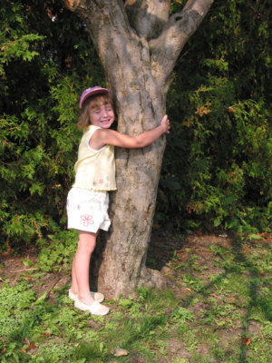 little tree hugger in training.jpg