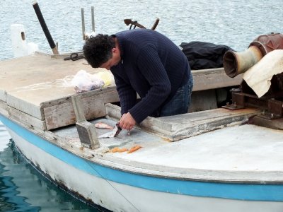 Filleting his catch