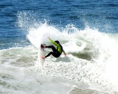 Surfing at the Huntington Beach Pier