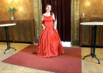 An Opera singer performing an aria for visitors