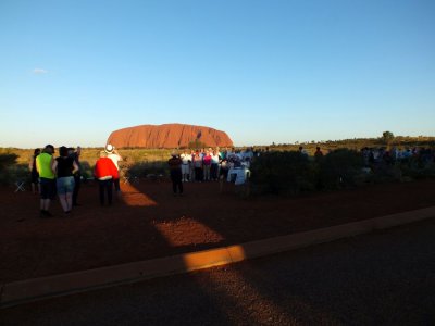 A lineup of sundowners waiting for sunset - the shadows are all the buses parked there