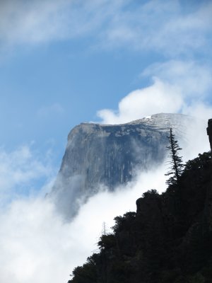 clouds clearing at Half Dome