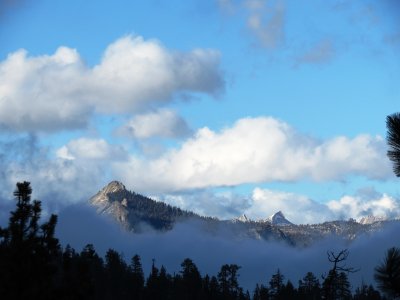 distant peaks above clouds