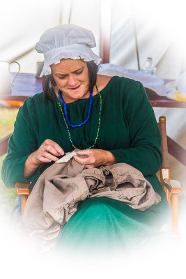 Woman sewing and mending