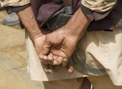 Worn hands of a Nepali farmer