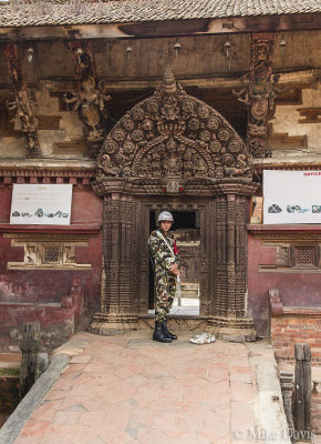 Guarded door to Hindu Temple