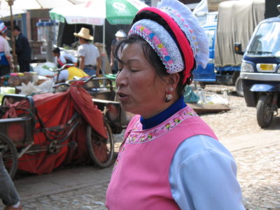 Dali - traditional Bai dress at Zhoucheng market