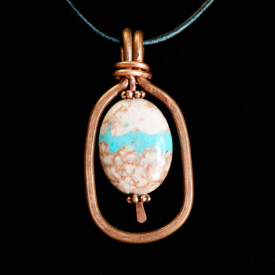 hand forged copper pendant with pilot mt turquoise