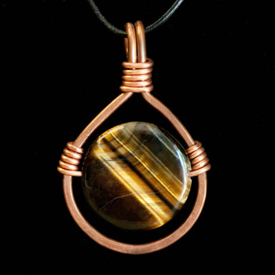 hand forged copper pendant with tiger eye