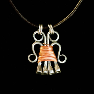 4 nail wrapped w copper pendant.jpg