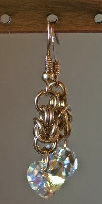 brass bz knot w swarov crystal hearts.jpg
