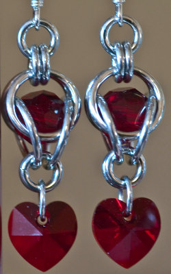 captive red bead w red heart dangle.jpg