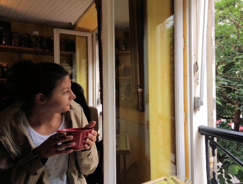 Enjoying a bowl of latte at the Coquelicot boulangerie & patisserie on rue des  Abbesses