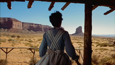 The Searchers iconic opening scene. Mitchell Mesa and Grey Whiskers Butte in distance