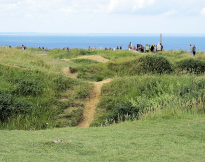 The surface of Point du Hoc is cratered from pre-invasion bombardment by Allied planes. 