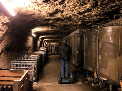 Our tour took us deep into the wine storage caves. Each bin held a different year's vintage.  