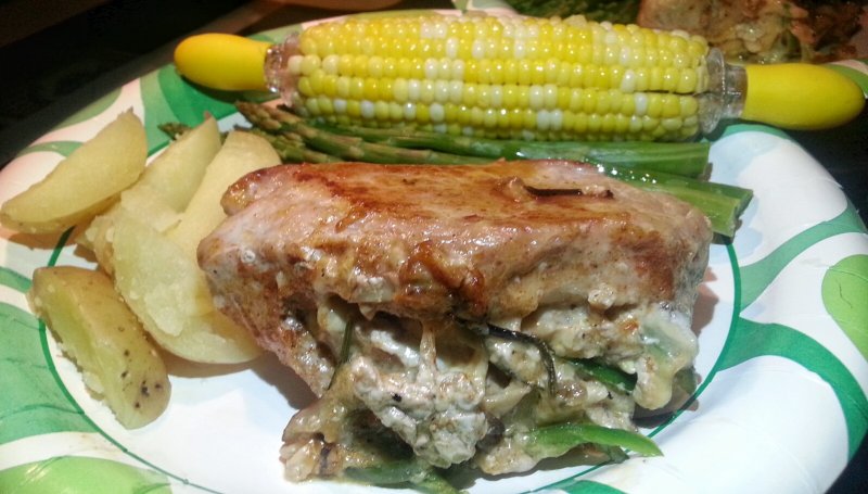 Thick cut pork chops stuffed with Gouda Cheese, mushrooms, jalapenos & spices. 