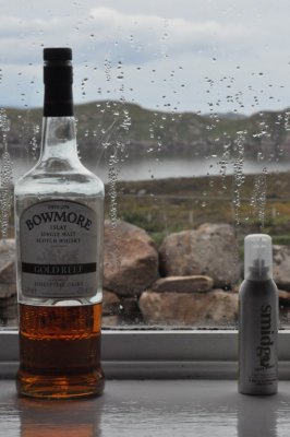 Three scottish liquids: Rain, Whisky and midge repellant