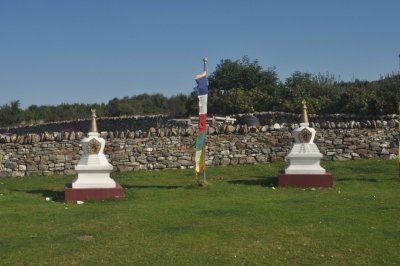 Chorten and prayer flags on Holy Isle