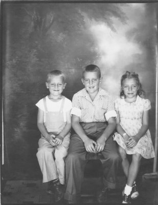 Chuck, Bob, Kay Van Fleet, Arnolds Park, Aug 23, 1945