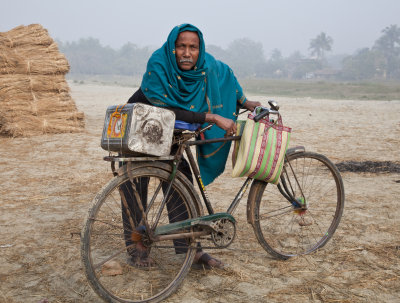 Interested biker along the Ganges