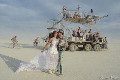 Burning Man Wedding with a passing Art Car