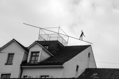 Balancing Man on the roof, Basel, Switzerland