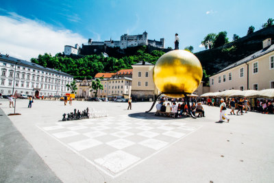 Sphaera Ball on Kapitelplatz, Man on Ball, Stephan Balkenhol , Giant Chessboard, Salzburg, Austria