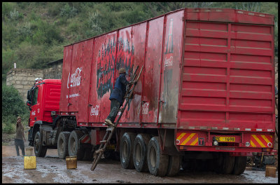Roadside handwashing of big trucks is common in Mai Maihu