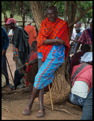 A very tall Masai at the cattle market in Longorien
