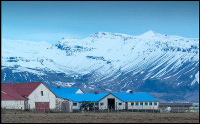 Farm with blue roof south of Hvolsvllur