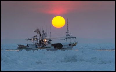 Fishing boat in the pack-ice between Japan and Russia