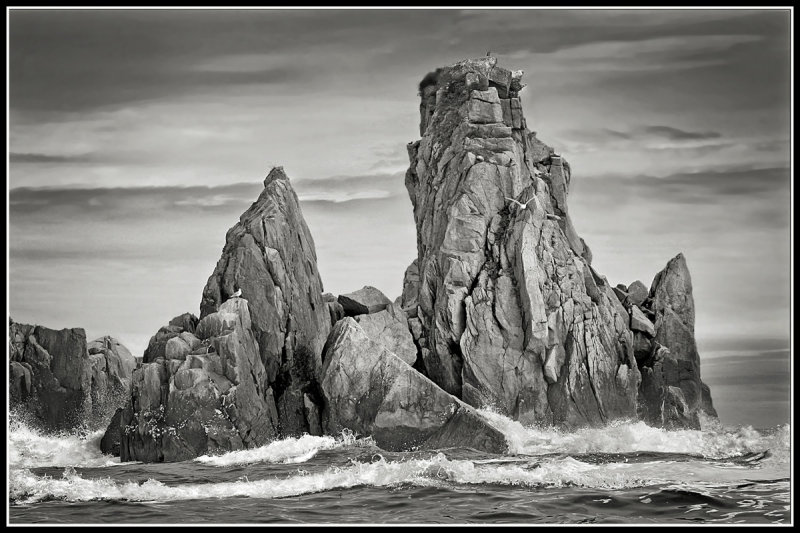 Pinnacles rise from the sea in Alaskas  Chiswell Islands.