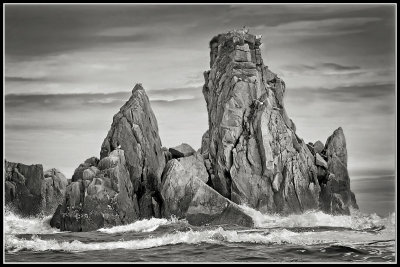 Pinnacles rise from the sea in Alaska's  Chiswell Islands.