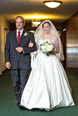 Miller-Klimmek_-Bill Steph down aisle-s- 2015.jpg