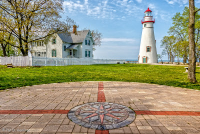 Lighthouse and compass