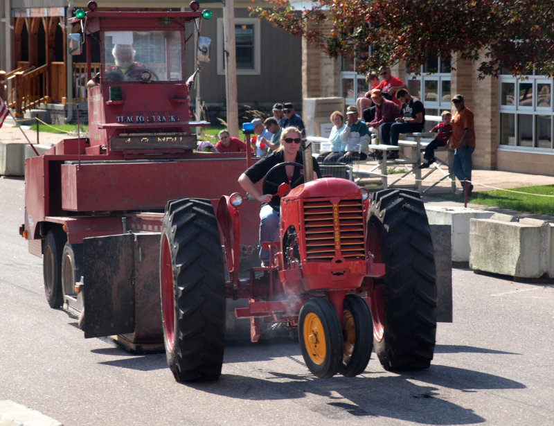 Just A Girl And Her Massey Harris Pullin A Wheelie On Main Street...