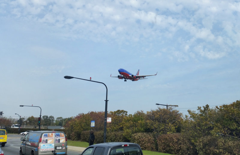 A SouthWest Airlines Flight Arriving At Chicago Midway...It's MUCH Closer Than It Looks Thru That Wide Angle Lens...