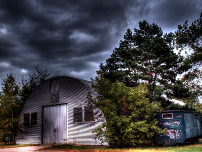 Old Buildings And Trailer.