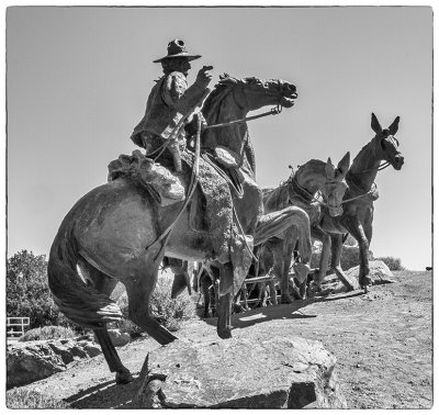 Santa Fe Bronze Statue of a covered wagon 1.jpg