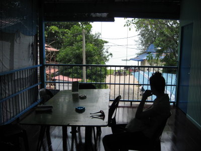 balcony at Baba's guesthouse.  the beach is just through the trees