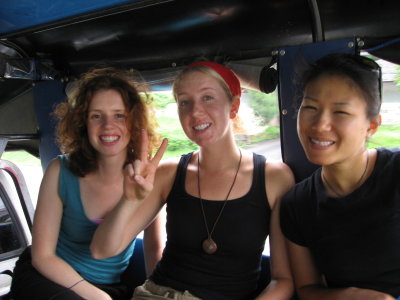in the back of a pick-up on the way to go trekking near chiang mai