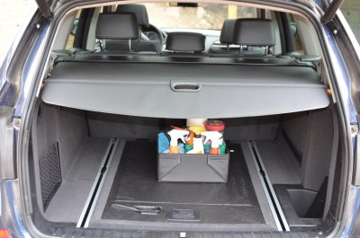 Rear cargo area with cover deployed