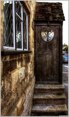 Door with a Horse Shoe Window